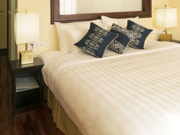 Parasol Blanc Hotel Classic room king bed