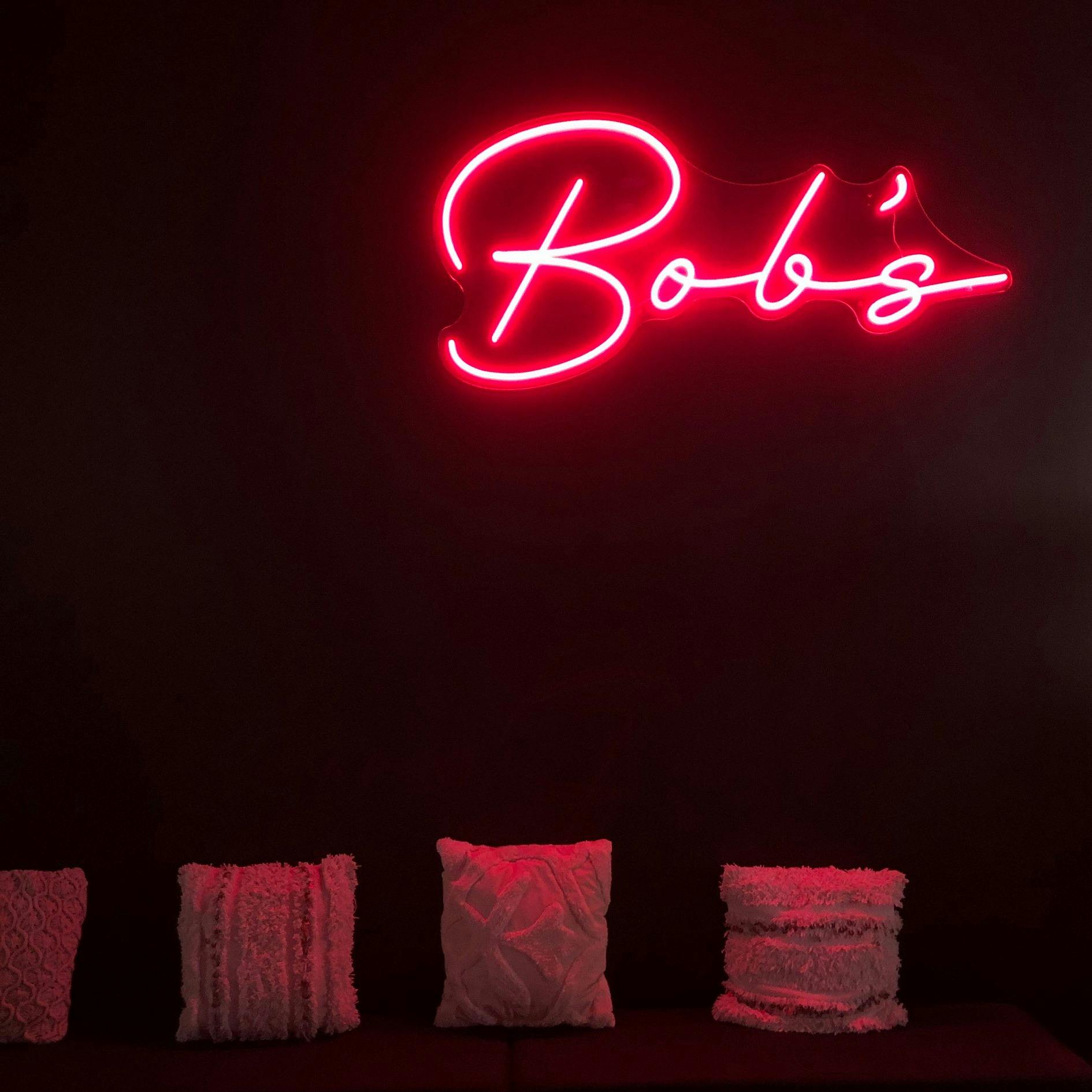 Bob's Boutiqe Bar, luxurious velvet lounges and neon lighting