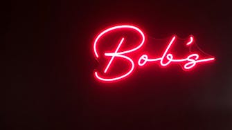 Bob's Boutiqe Bar, luxurious velvet lounges and neon lighting