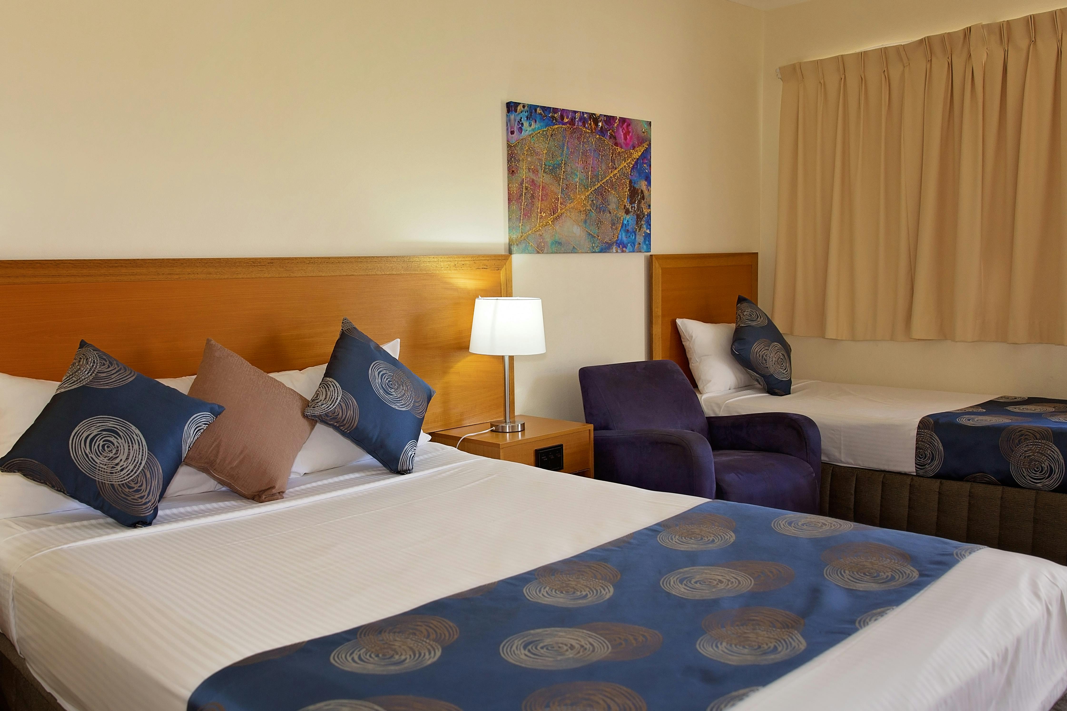 Room with queen and single bed