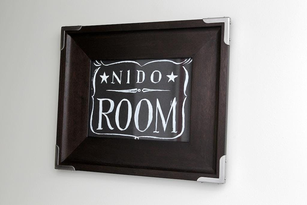 Junior Suite Nido Room, logo