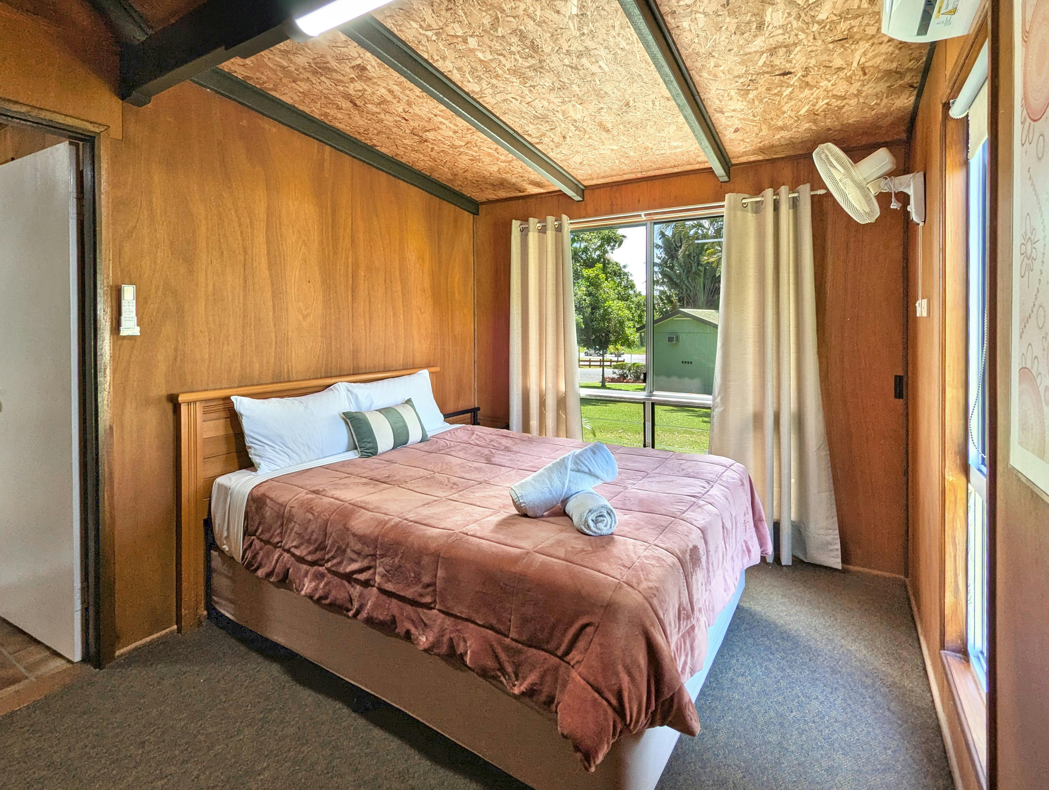 queen bed in cabin 12