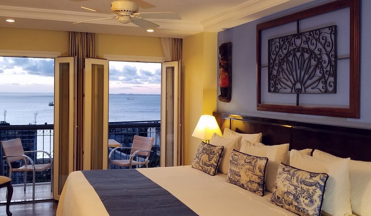 DeLuxe room inner view with bay view and varanda at sunset