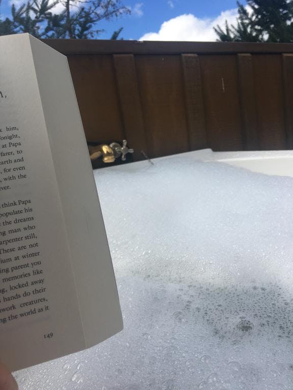 Relaxing in the bath with a book after a morning forest walk...