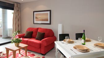 boulevard apartamentos by mimar living and dining room