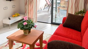 boulevard apartamentos by mimar livingroom and terrace
