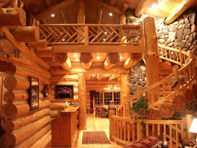 The main floor of the lodge: the bar, the diningroom and the spectacular circular staircase.