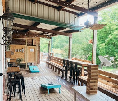 games on the back deck of tipsy daisy bar