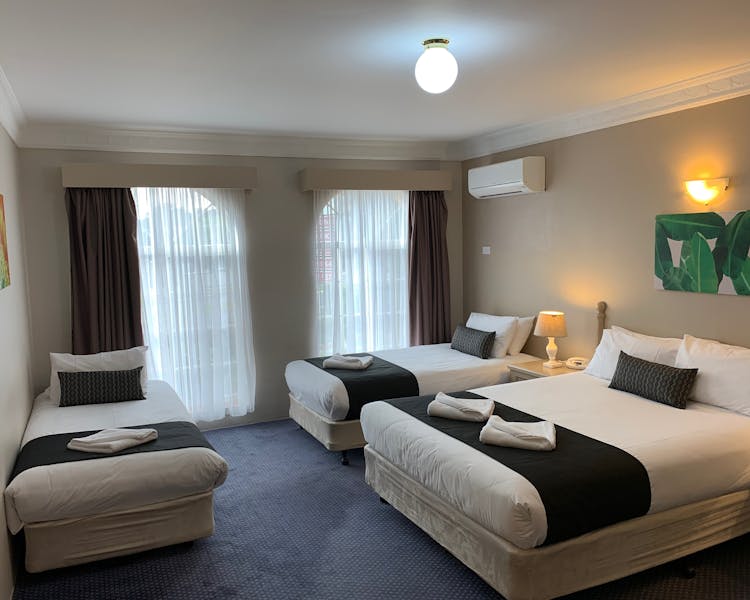 Family Room - One Queen & 2 Single Beds