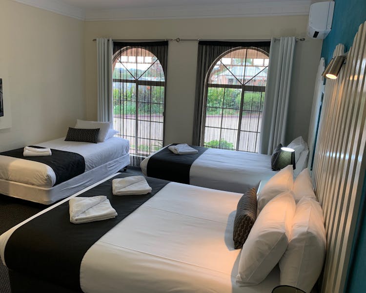 Family Room - One Queen & 2 Single Beds