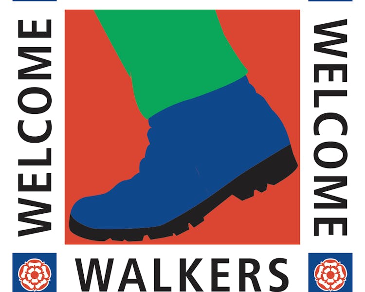 Walkers welcome logo for the Old Schoolhouse Bed and Breakfast in Haltwhistle, Northumberland