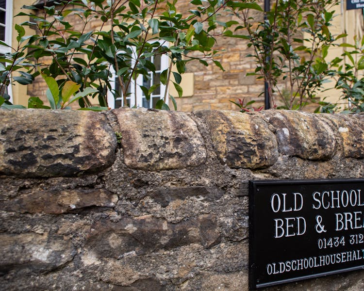Street sign for the Old Schoolhouse Bed and Breakfast in Haltwhistle