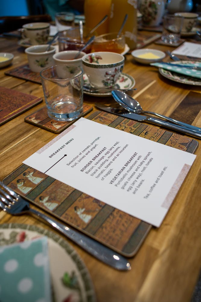 Dinner menu and place setting at The Old School House