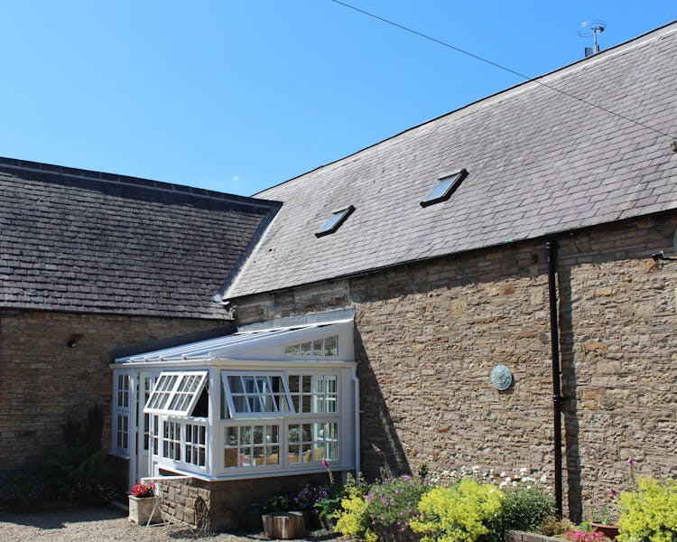 Exterior view of the sunroom at the Old Schoolhouse Bed and Breakfast in Haltwhistle, Northumberland