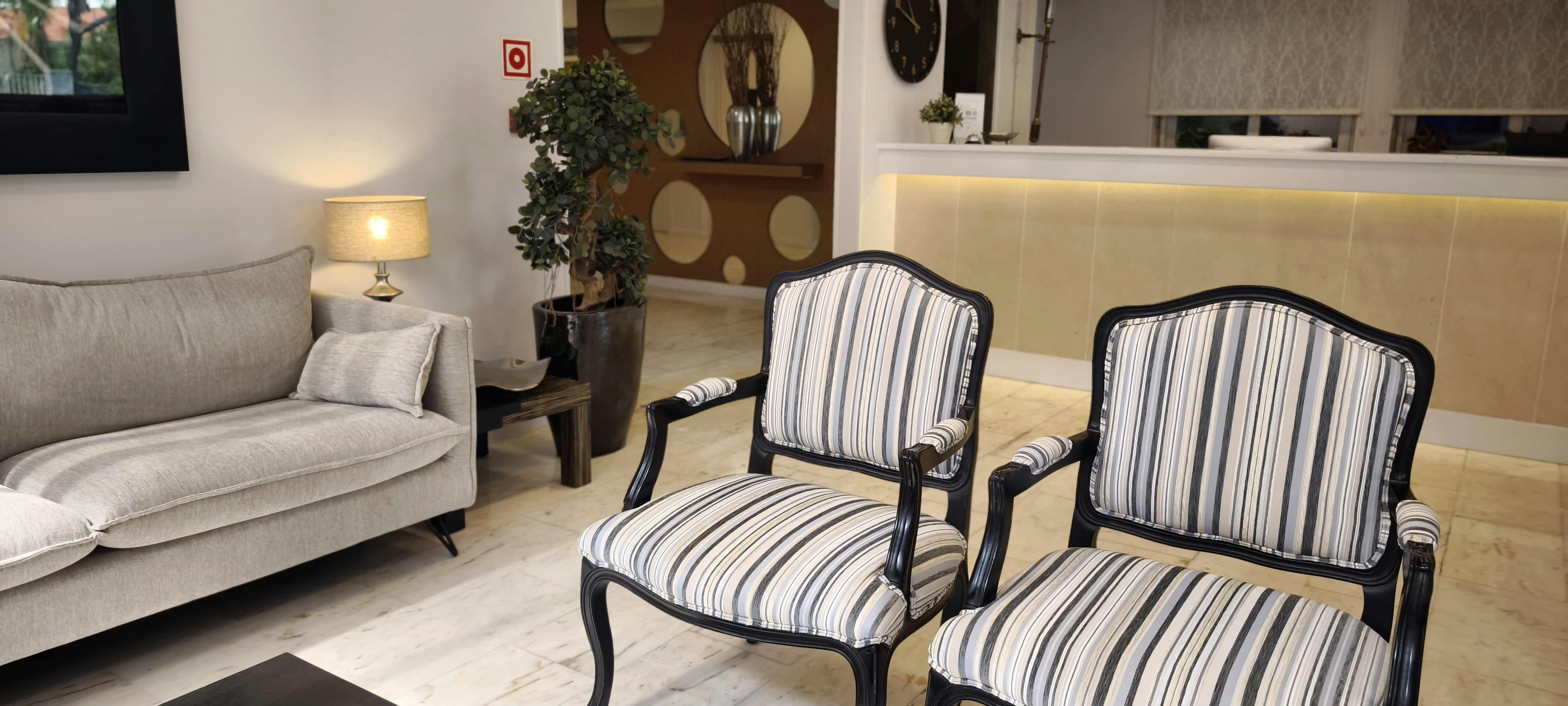 Modern and bright renovated lobby area near Tamariz Beach and Casino