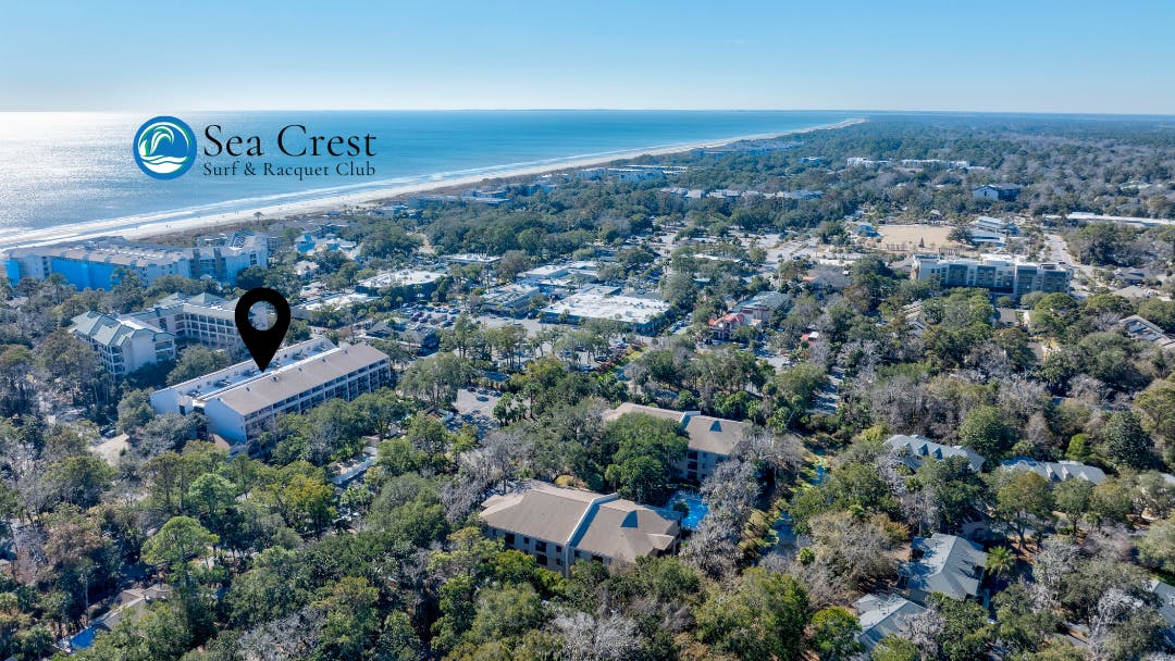 Aerial with location pin on Sea Crest Surf & Racquet Club and ocean in the background