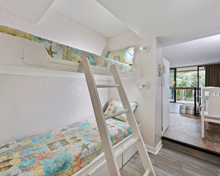 Built-in twin bunk beds cove ideal for families in Sea Crest two-bedroom Hilton Head vacation rental