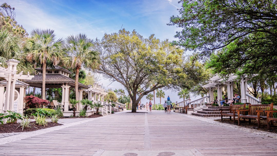 Coligny Beach Park Hilton Head Island with ocean access, walking paths, swings, chairs, and bathrooms.
