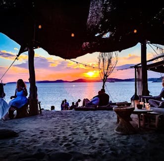 mykonos sunset relax beach experience