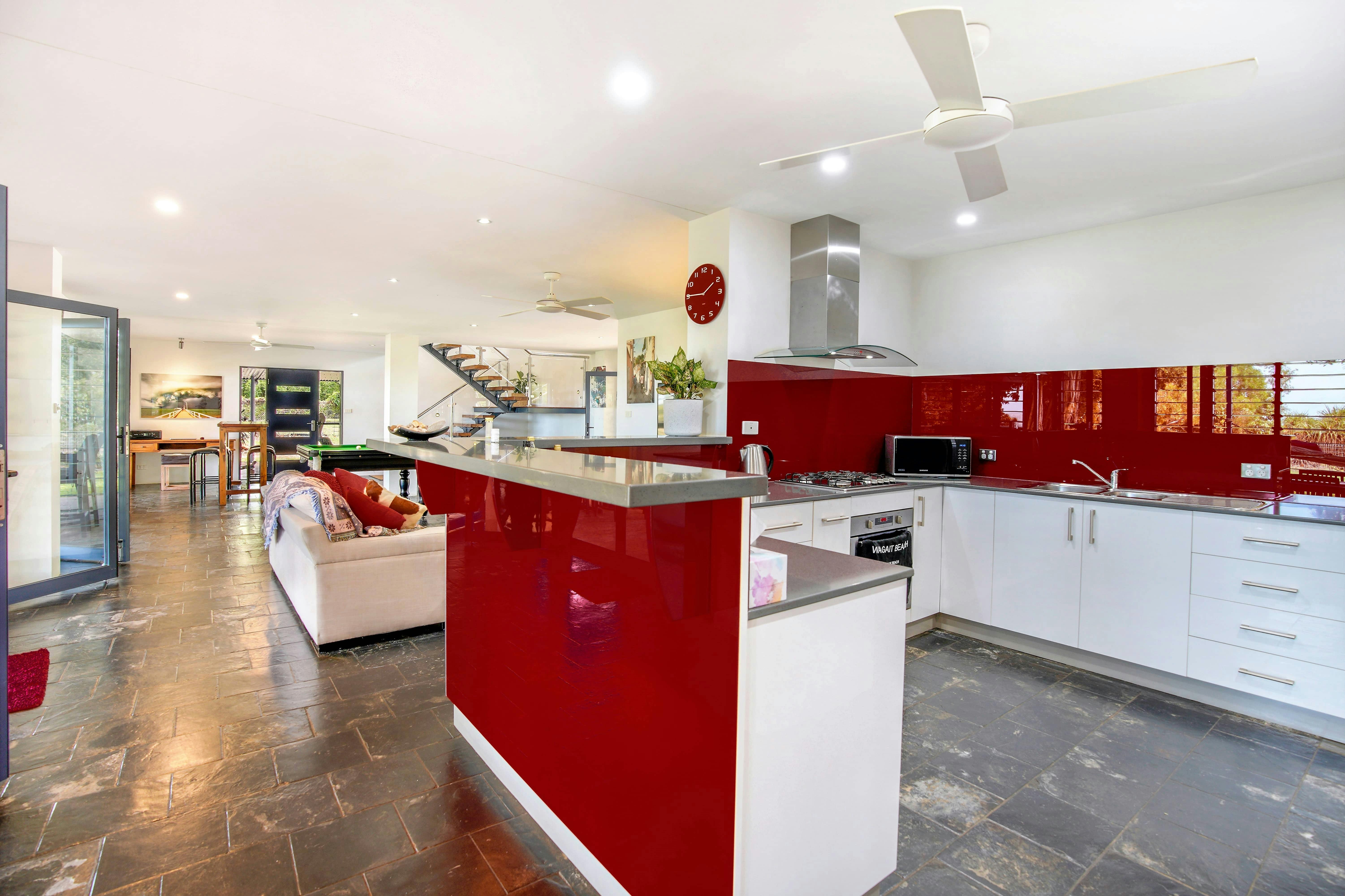 Comfortable Living Room and Games Room with Smart TV and Kitchen