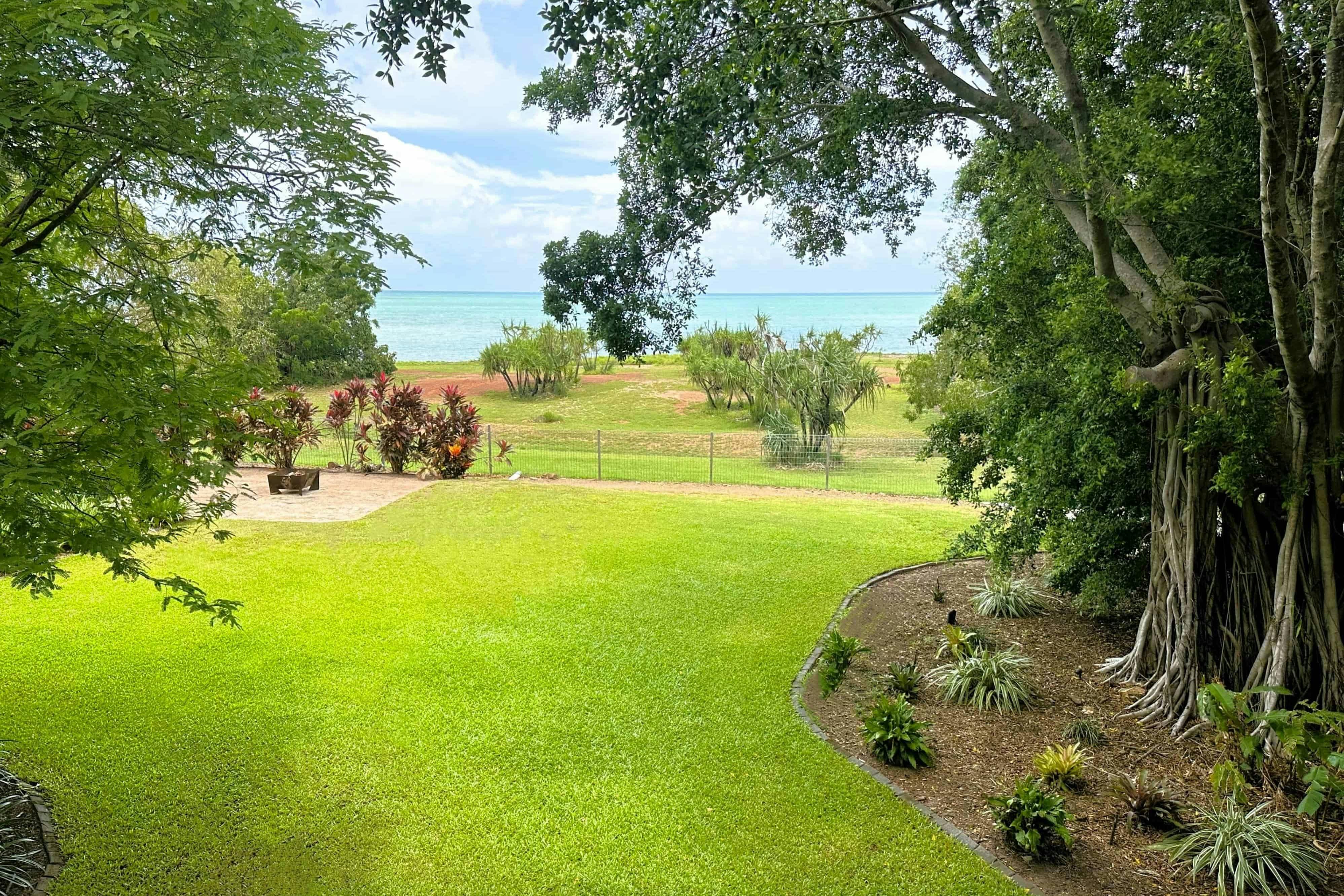 Beachfront Firepit on the Green Lawn with Sea Views