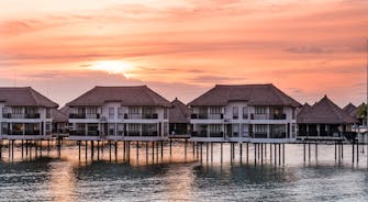 golden_palm_tree_overwater_villa