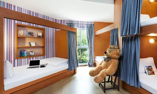 Family and Friends room with four bunk beds and garden views