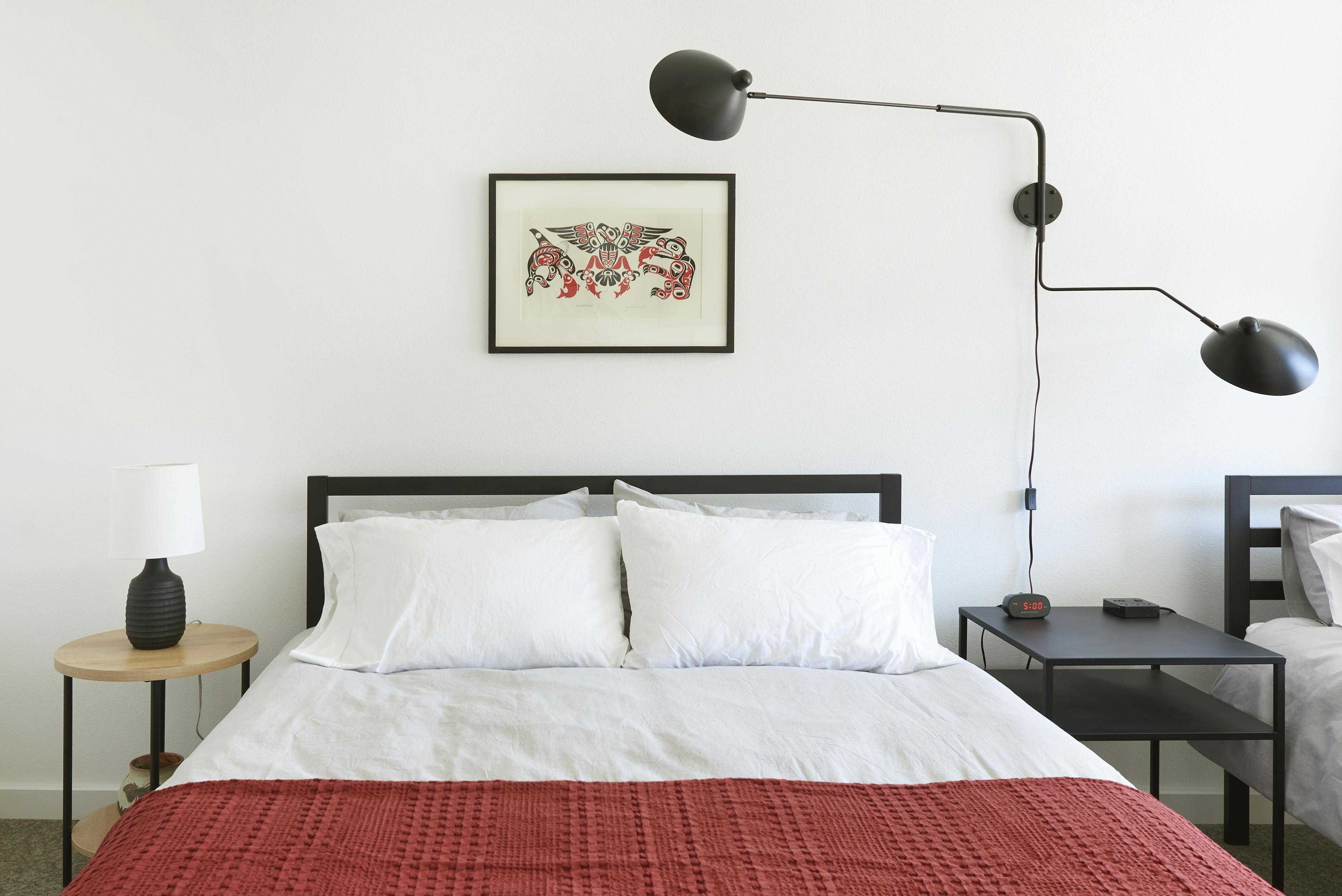 Two queen beds, attached bathroom, full kitchen.