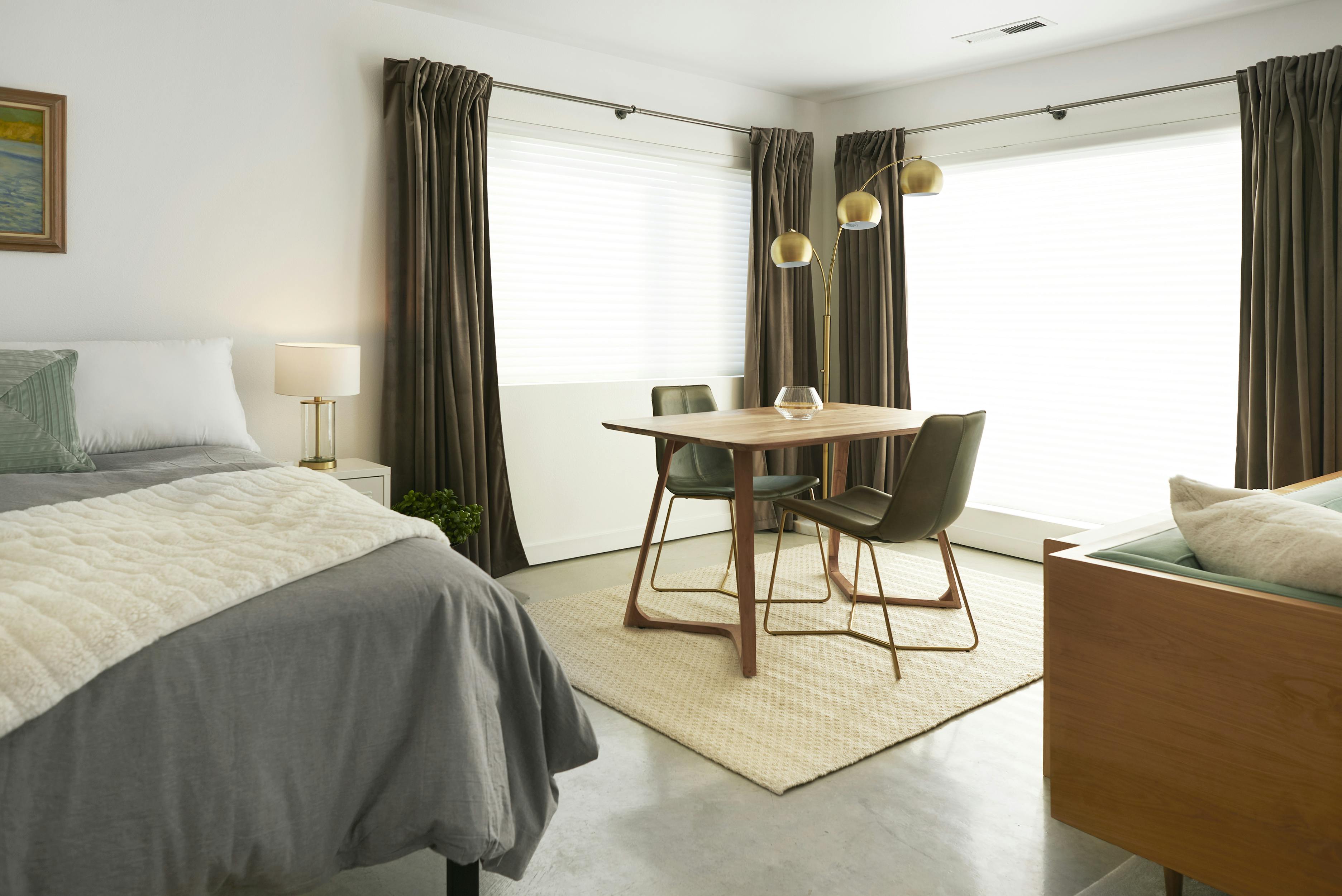 One queen bed with detached private bathroom.