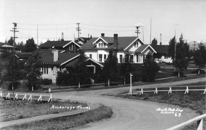 Archival photo of downtown Anchorage, Alaska with the historic Leopold David House shown.