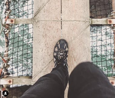 Walking through the Carrick a rede rope bridge