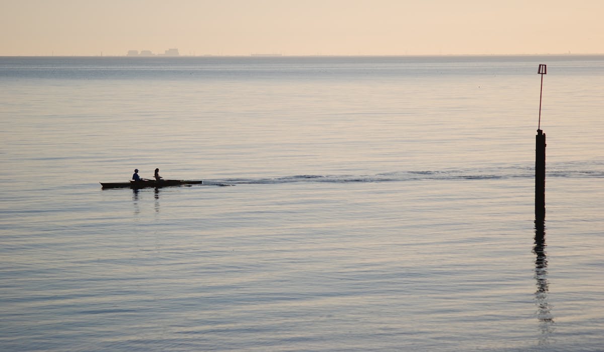 Canoists on the sea, stunning calm day