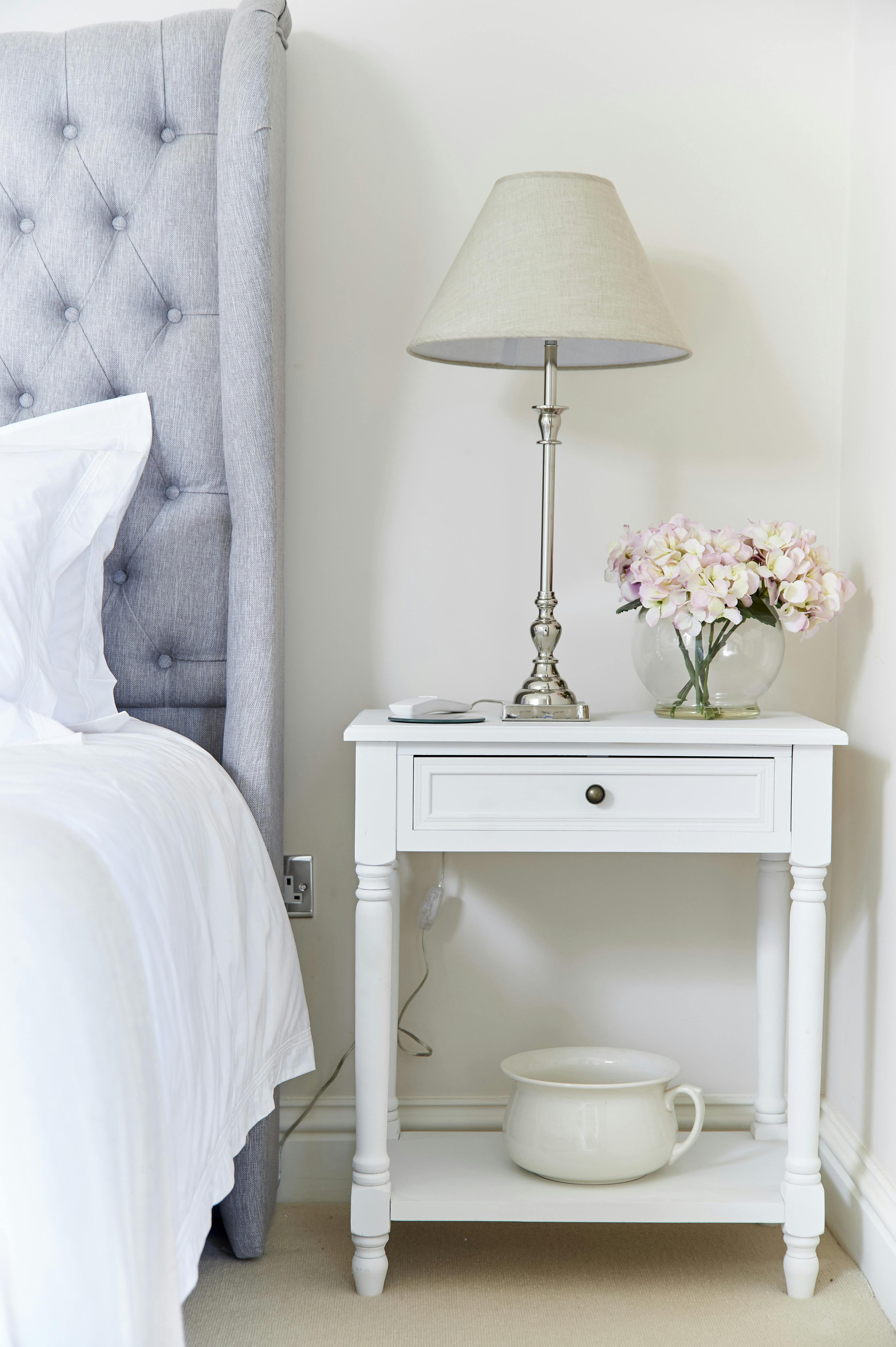 Vintage Style side Table and lamp to Master Bedroom with decorate hydrangea flower bowl