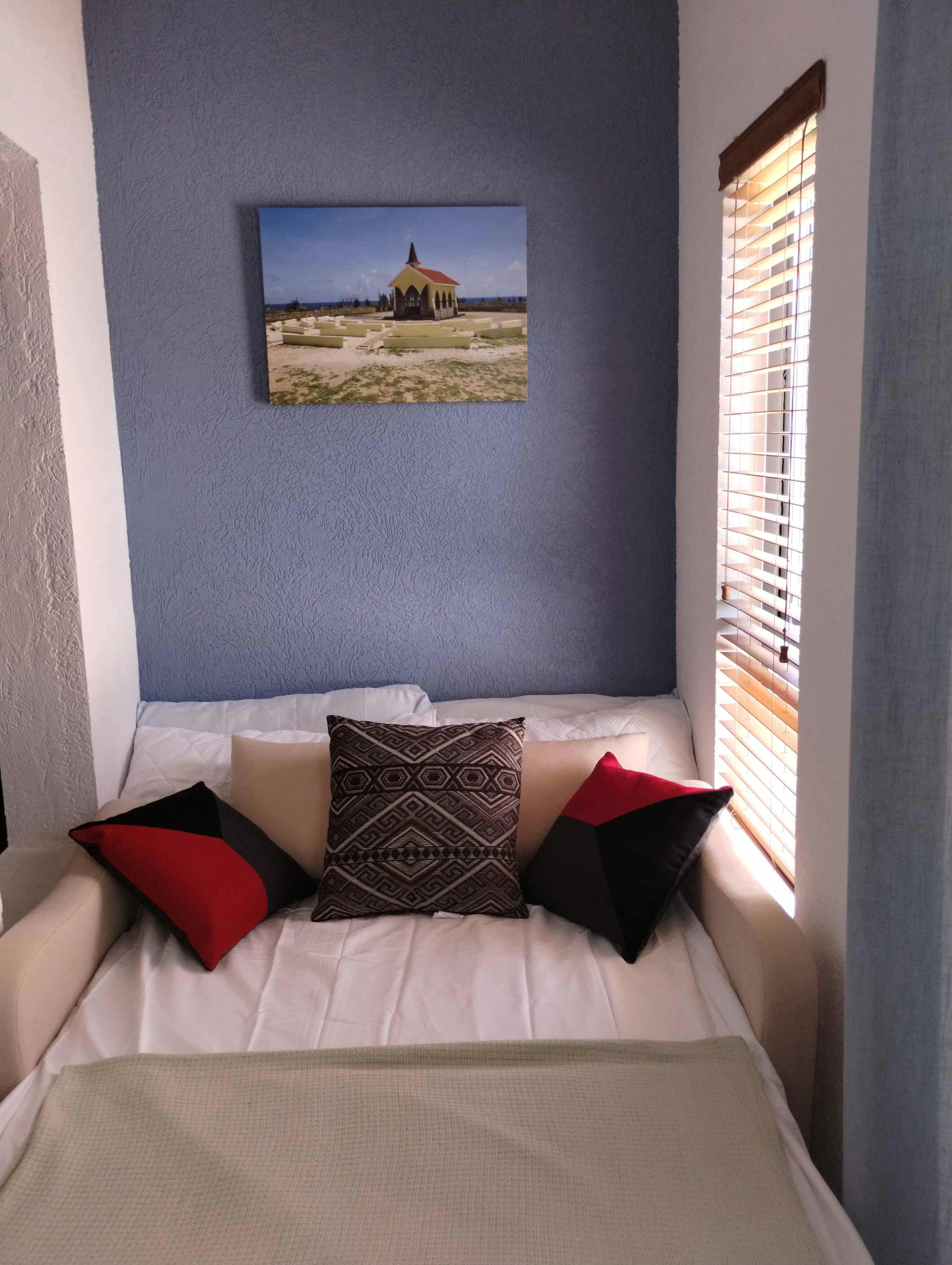 Master Bedroom couch pulls out into a double bed