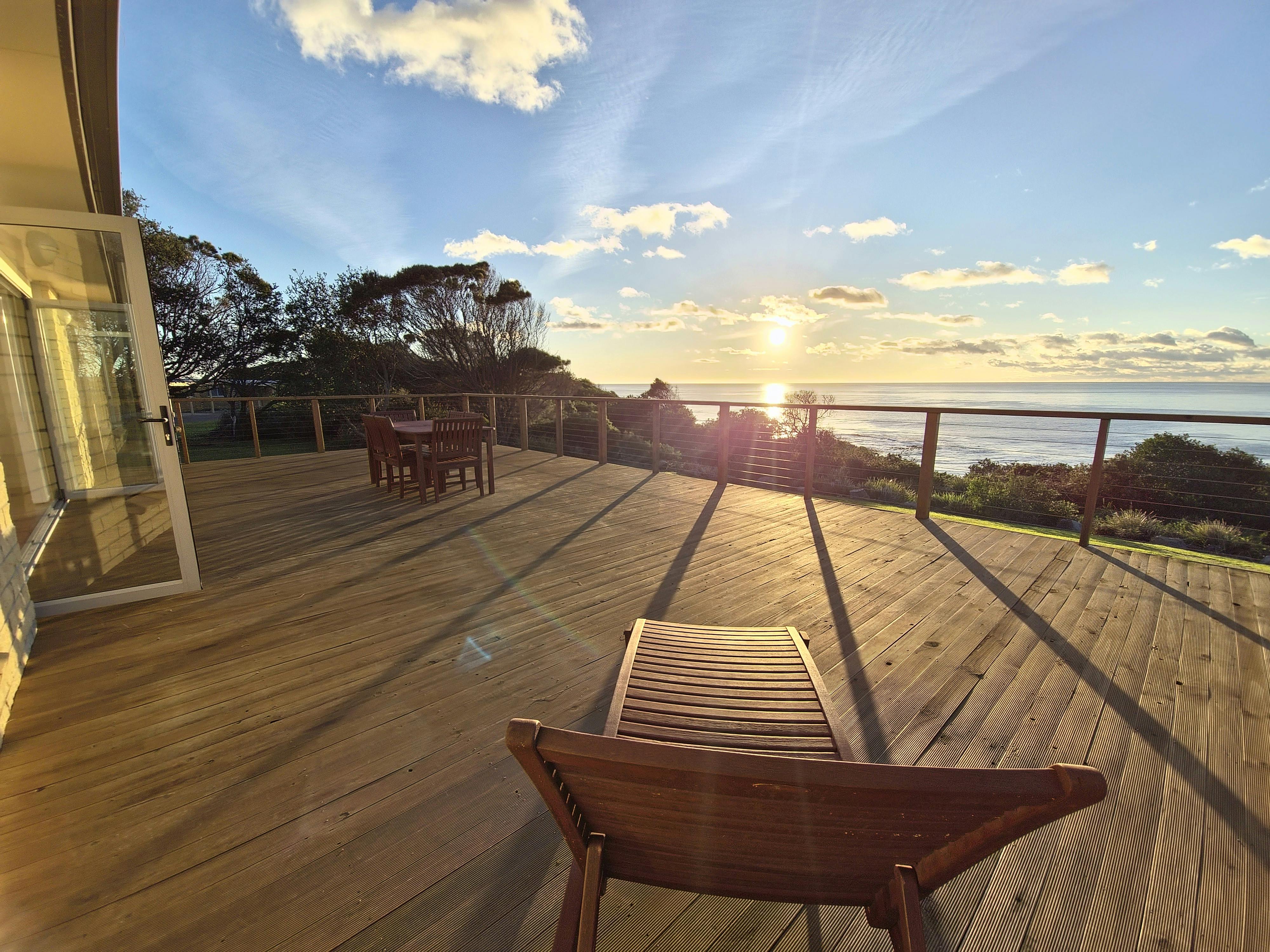 Oceanfront deck at sunrise, White Sands Estate accommodation