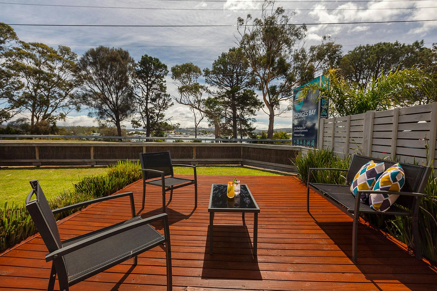 Enjoy afternoon drinks on the Harbour View Apartment Deck.