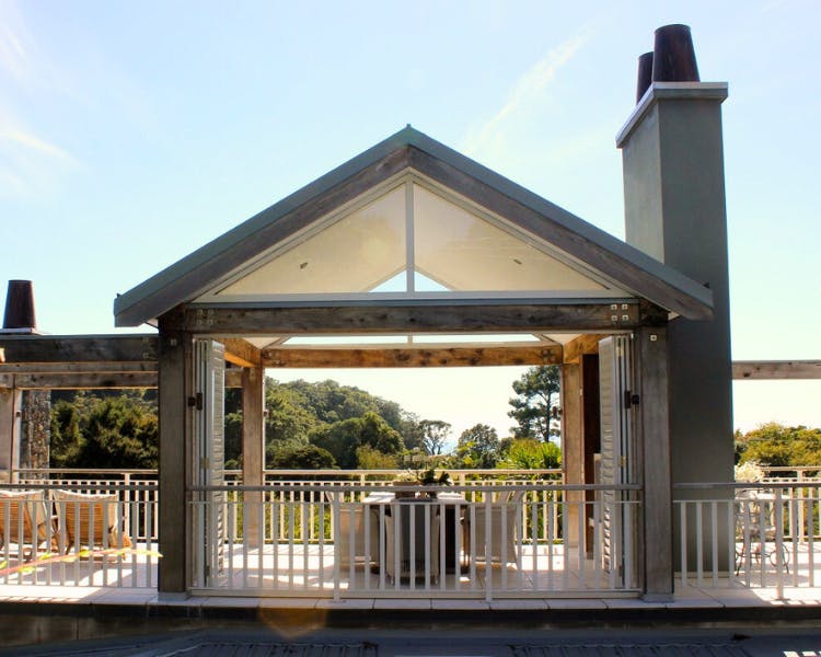 Outdoor dining and seating area - Estuary Terrace Suite, 970 Lonely Bay Lodge