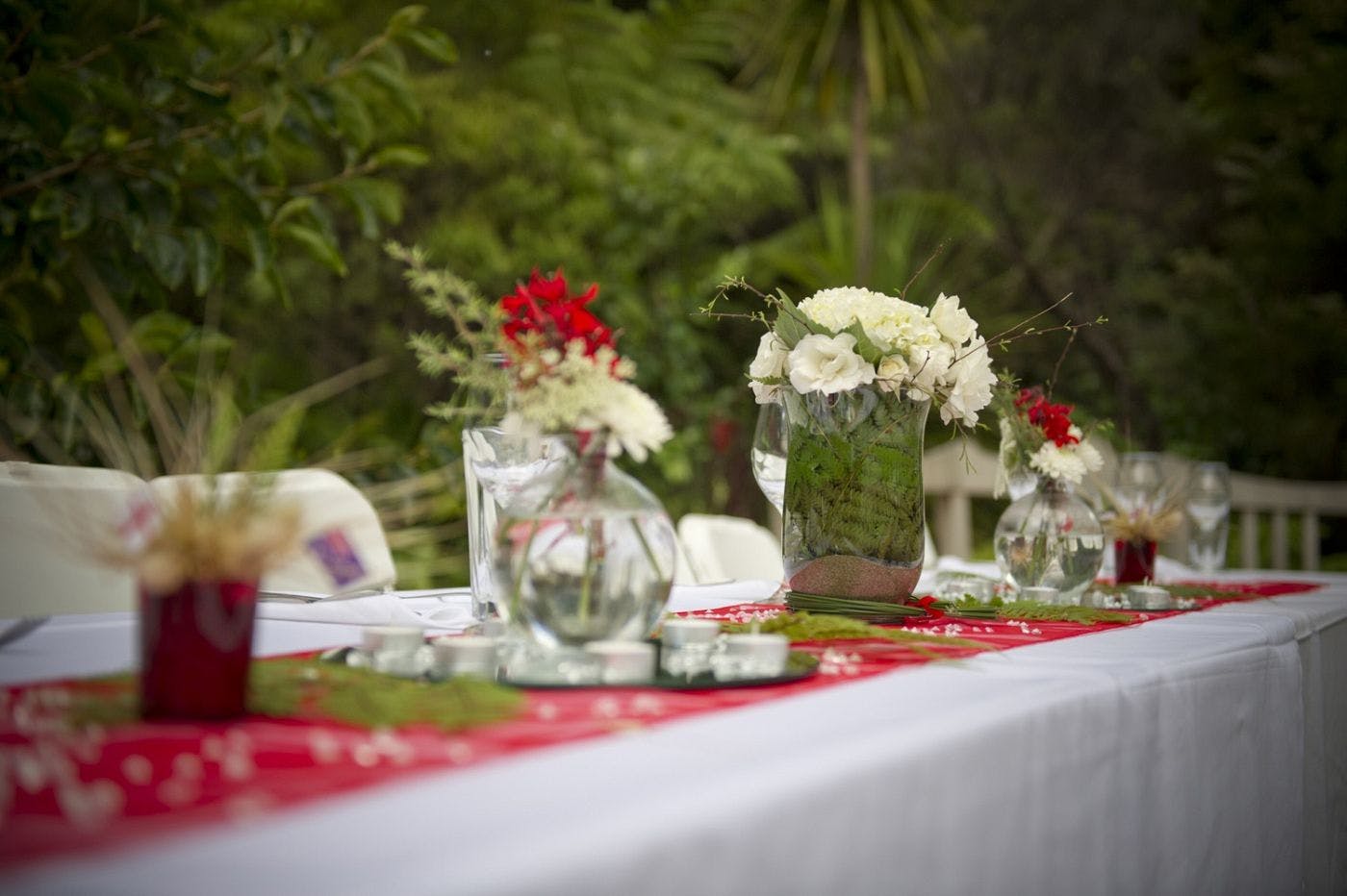Table settings for outdoor wedding meal - 970 Lonely Bay Lodge