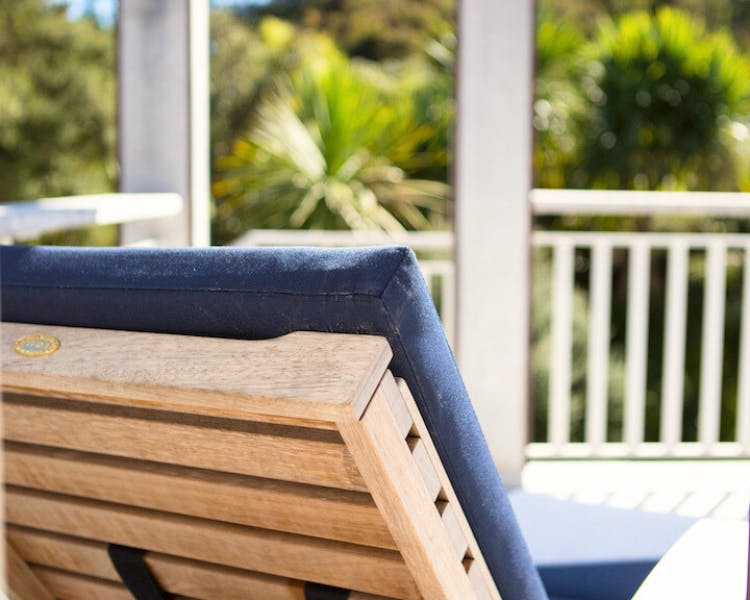Outdoor seating on upstairs private deck - Estuary Terrace Suite, 970 Lonely Bay Lodge