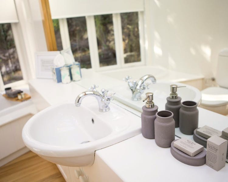 Bathroom with bath and vanity - Shakespeare Suite, 970 Lonely Bay Lodge