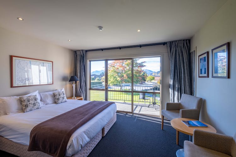 Comfortable and cozy standard room at Oakridge Resort, with a plush bed, modern decor, and all the necessary amenities for a