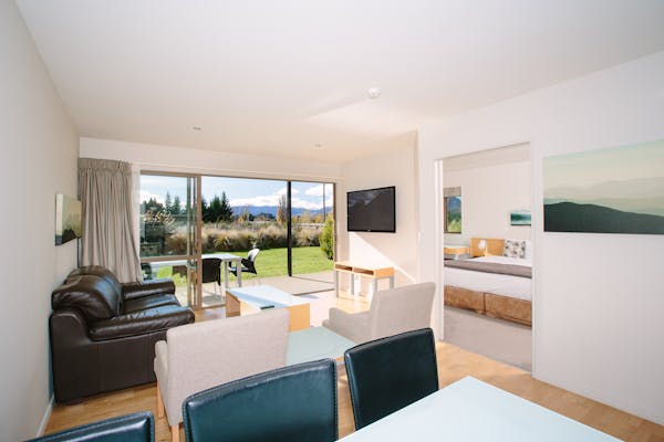 Modern and inviting two-bedroom apartment at Oakridge Resort, perfect for families or groups with a separate living area and