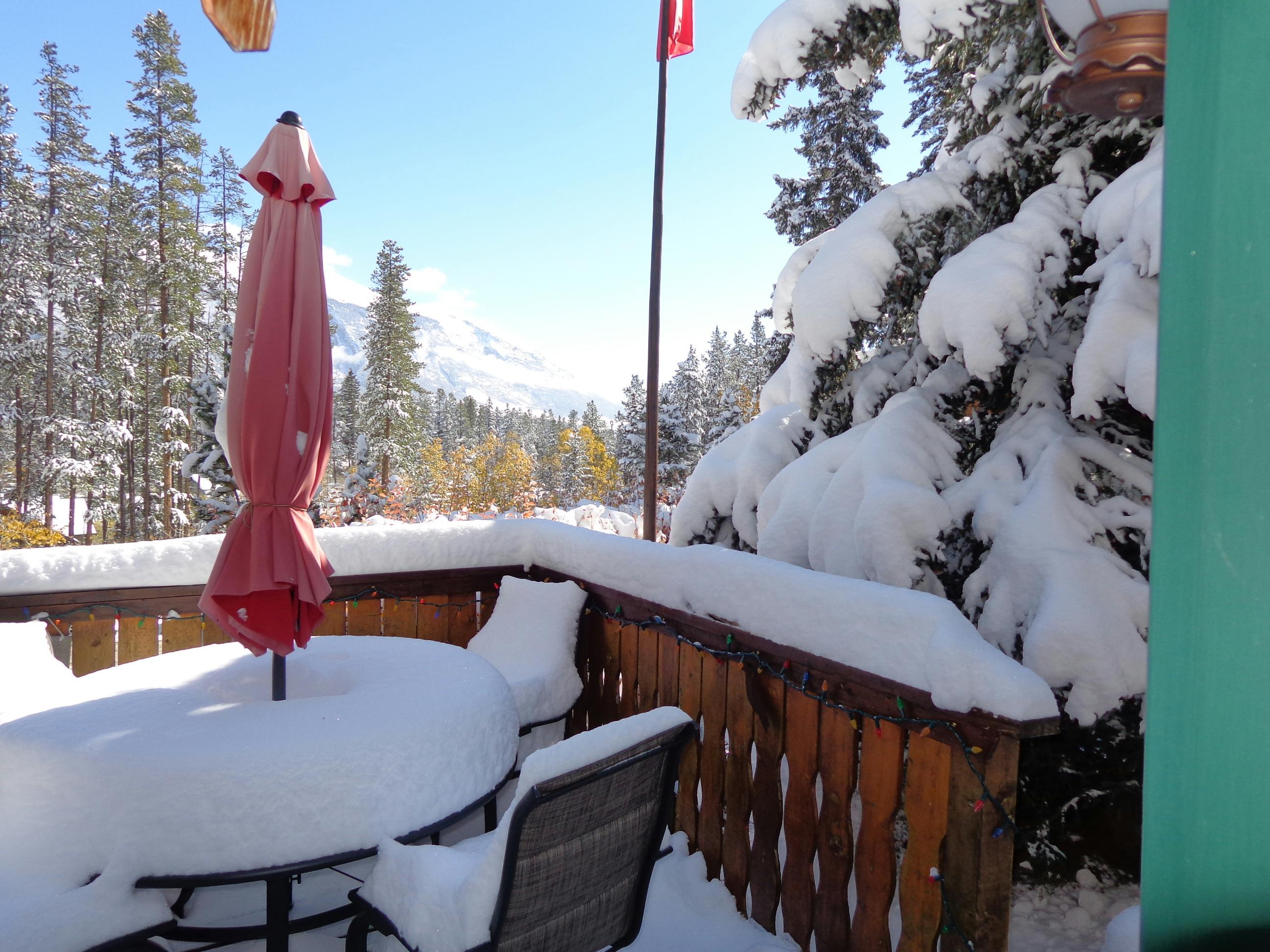 Our front deck covered by a surprise snowstorm - Roger will clear it soon