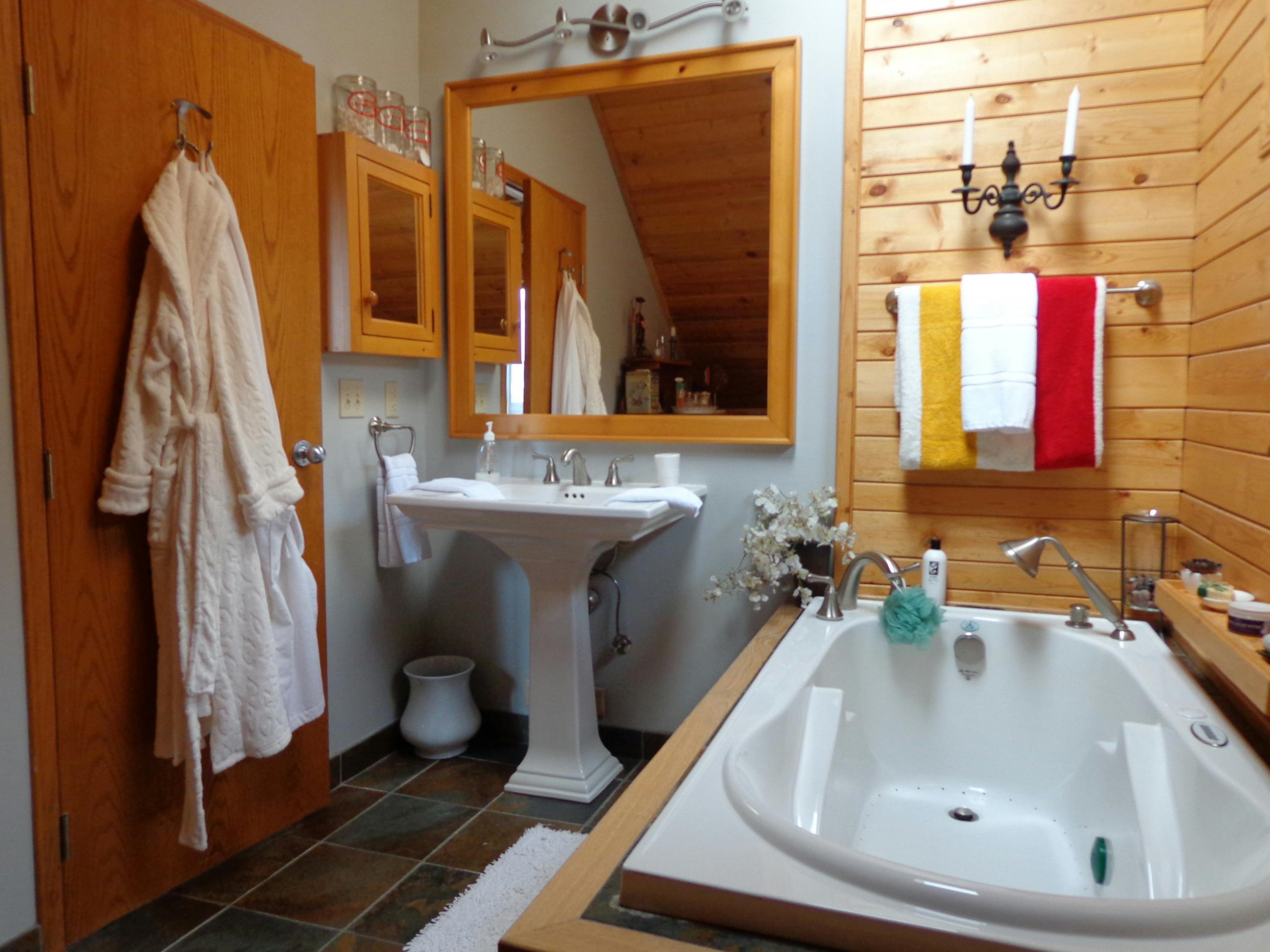 Mountain View ensuite bathroom has massage tub and hand shower