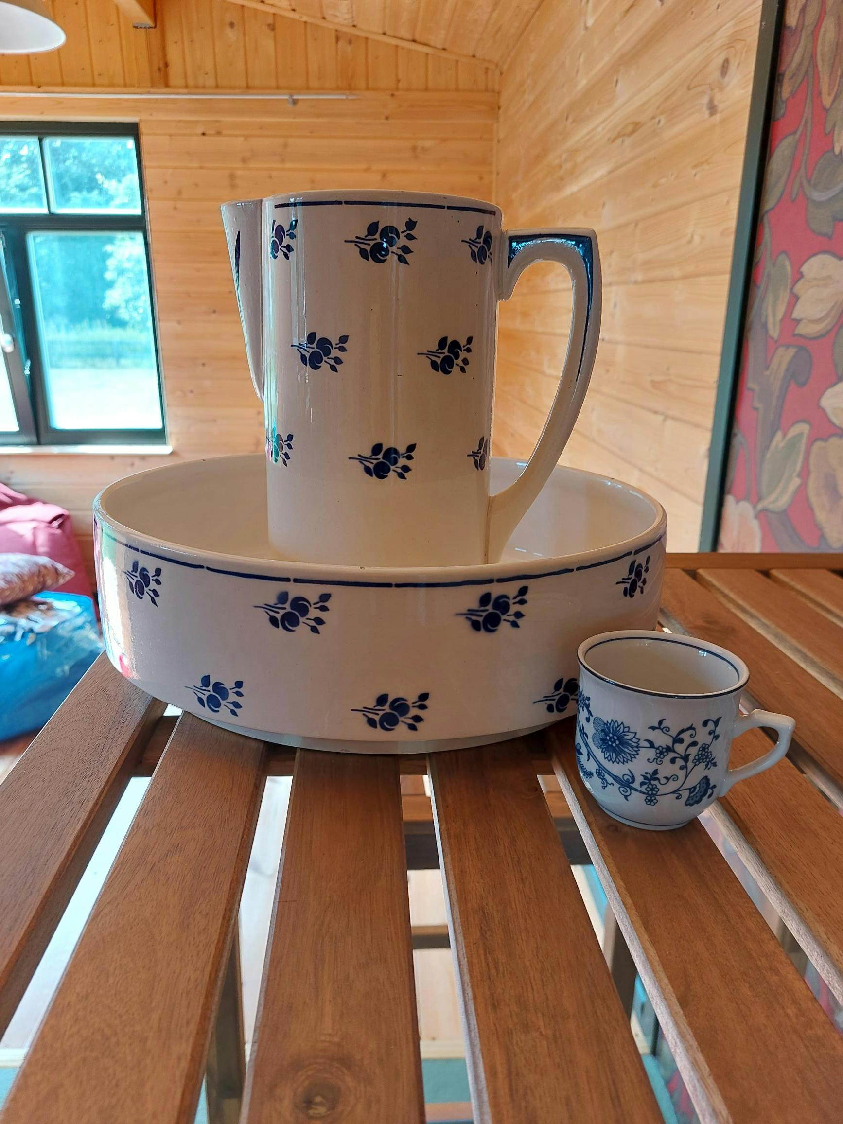 Vintage porcelain pitcher and basin for washing up