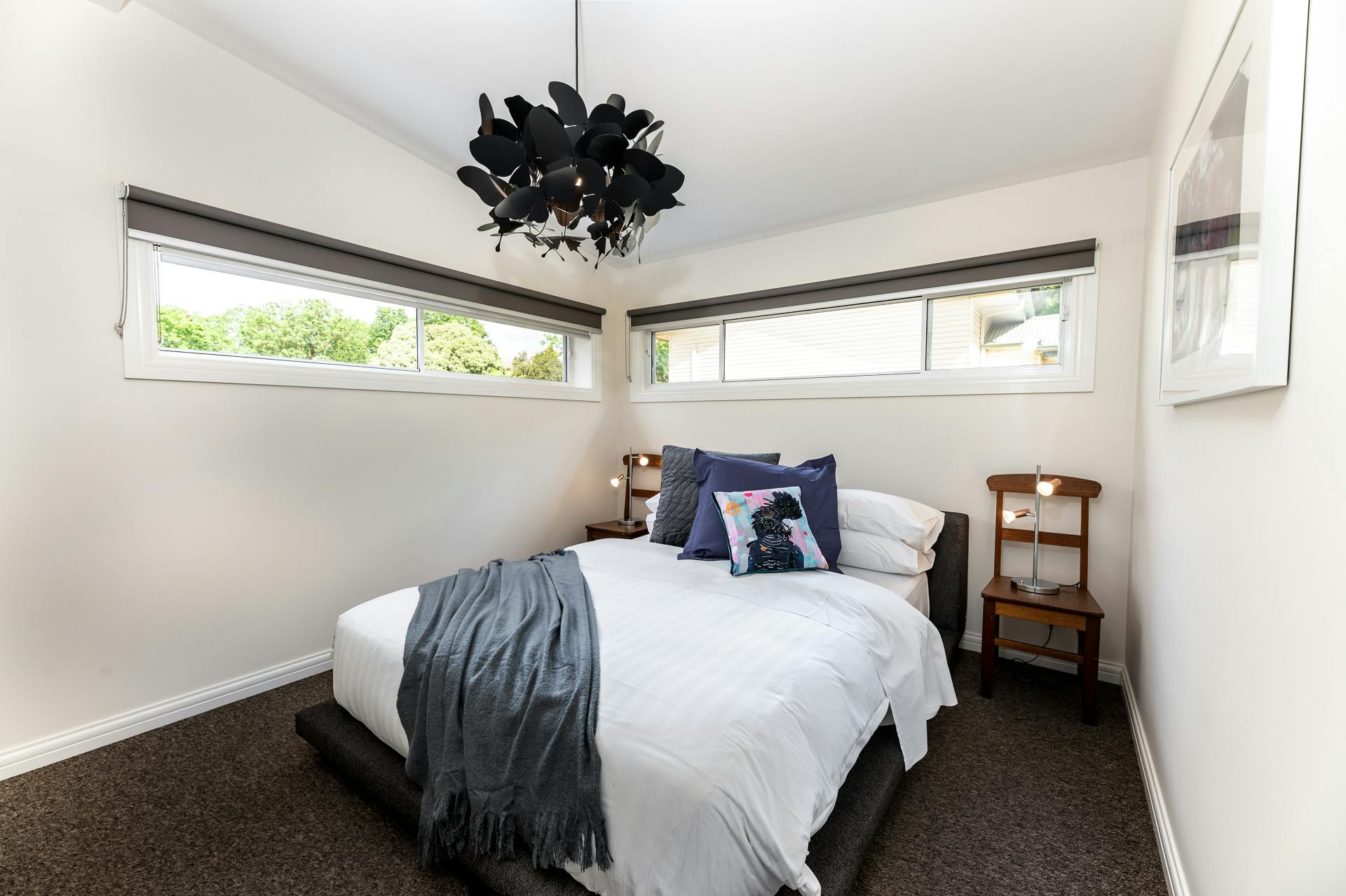 Light filled separate bedroom, with butterfly chandelier