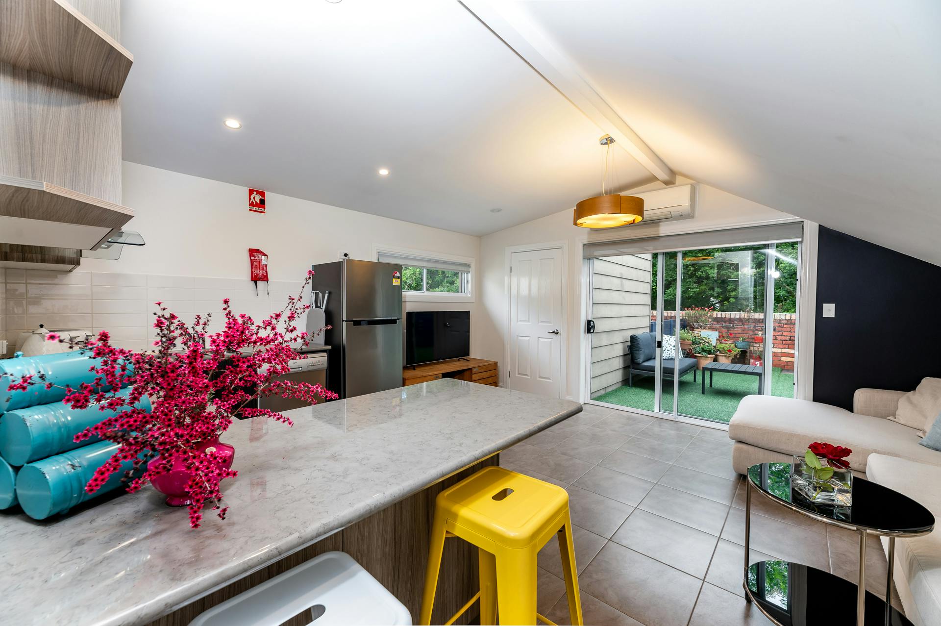 Bench seating and lounge through to deck