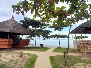 Traditional Bahay Kubo huts facing Takbo Beach. 1