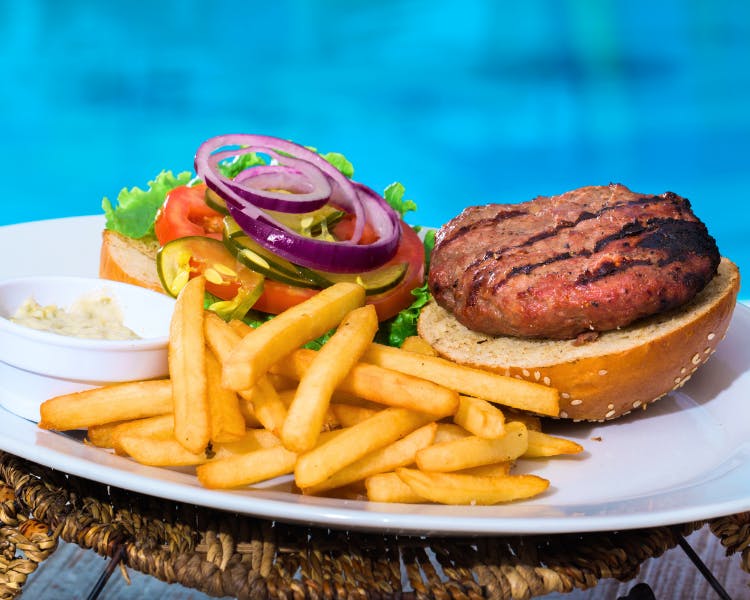 Summer Bay Orlando by Exploria Resorts - poolside bar and grill. Poolside snacks, meals, and drinks.