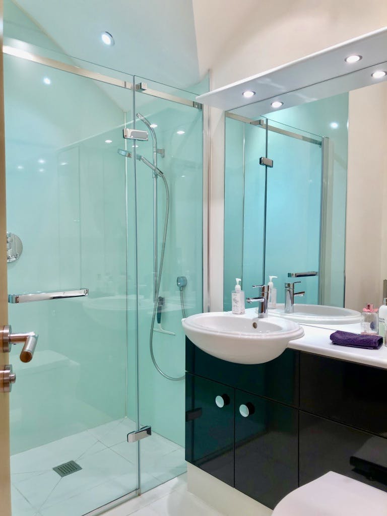 bedroom 2 En-suite wet room shower area with fitted cabinets